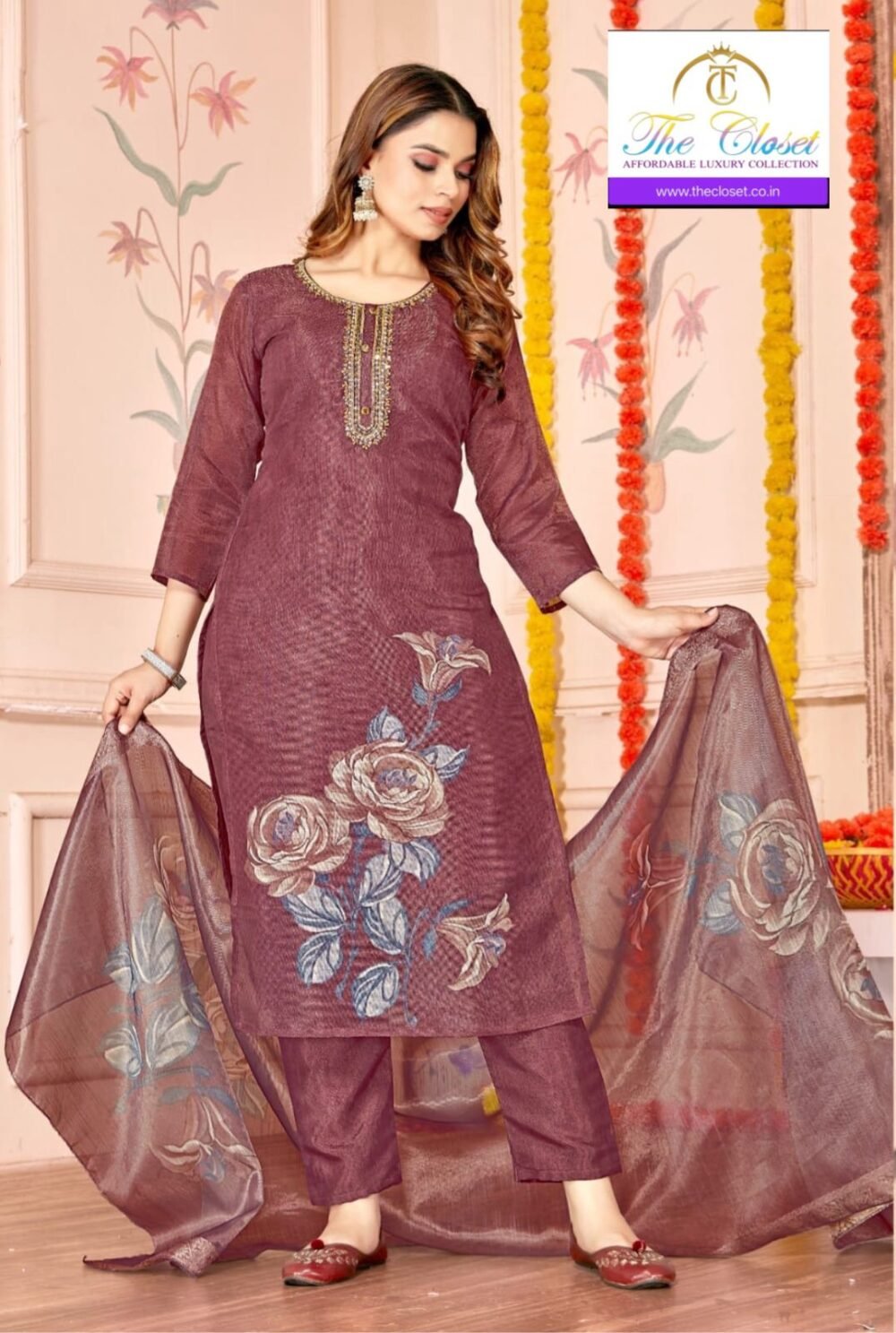 A Graceful Women’s Suit Set featuring Intricate Neck Embroidery Work