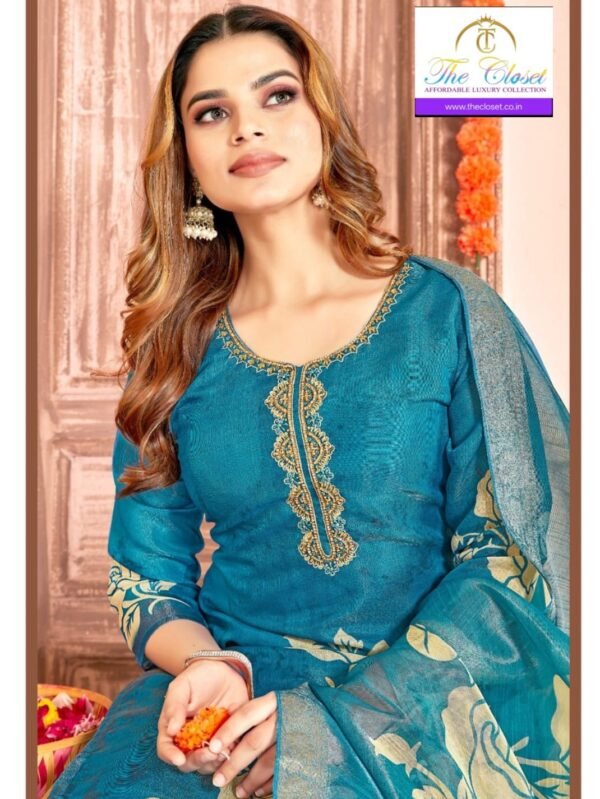 A Graceful Women’s Suit Set featuring Intricate Neck Embroidery Work