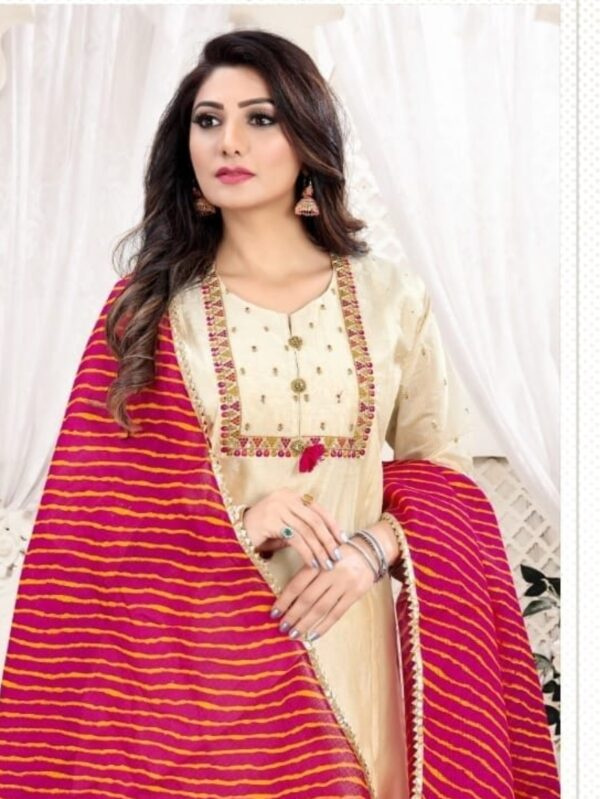 Elegant Women’s Suit Set Adorned with Embroidery on the Neck