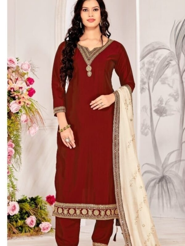 A Graceful Women’s Suit Set featuring Intricate Embroidery Work on Neck & Bottom of Kurta and a Beautiful Dupatta